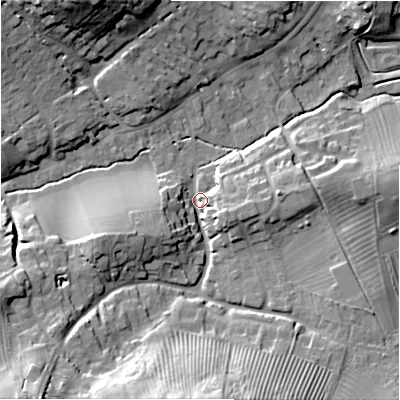 Shaded relief map of the ground around GL556DR, computed from Environment Agency LiDAR. The ground here sits at about 143 m above sea level and falls 34 m across the surrounding 800 m. Surface water reaching this point runs off ground lying to the south, 27.3 m higher.
