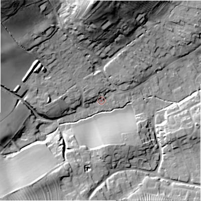 Shaded relief map of the ground around GL556EA, computed from Environment Agency LiDAR. The ground here sits at about 142 m above sea level and falls 42 m across the surrounding 800 m. Surface water reaching this point runs off ground lying to the north-west, 38.5 m higher.