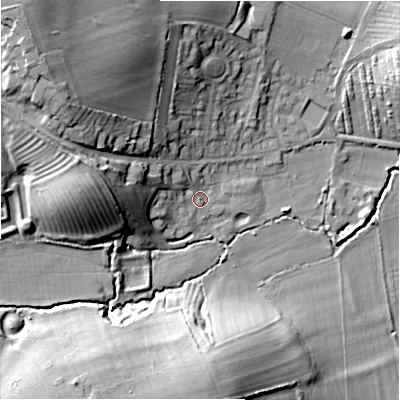 Shaded relief map of the ground around GL556ET, computed from Environment Agency LiDAR. The ground here sits at about 127 m above sea level and falls 31 m across the surrounding 800 m. Surface water reaching this point runs off ground lying to the west-north-west, 17.1 m higher.