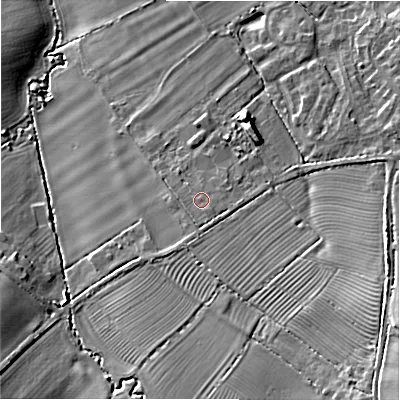 Shaded relief map of the ground around GL556PT, computed from Environment Agency LiDAR. The ground here sits at about 72 m above sea level and falls 17 m across the surrounding 800 m. Surface water reaching this point runs off ground lying to the south, 1.2 m higher.