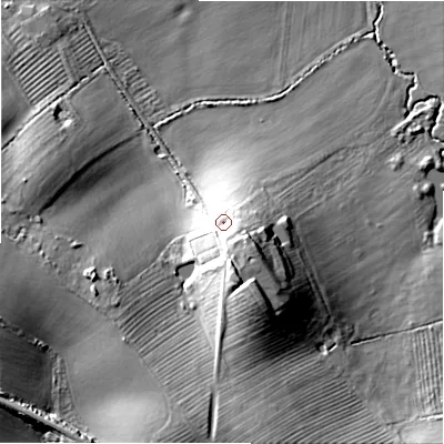 Shaded relief map of the ground around GL556PU, computed from Environment Agency LiDAR. The ground here sits at about 76 m above sea level and falls 32 m across the surrounding 800 m. Surface water reaching this point runs off ground lying to the south-south-east, 10.6 m higher.
