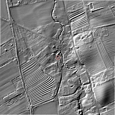 Shaded relief map of the ground around GL556QH, computed from Environment Agency LiDAR. The ground here sits at about 71 m above sea level and falls 21 m across the surrounding 800 m. Surface water reaching this point runs off ground lying to the south, 1.3 m higher.