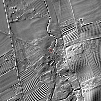 Shaded relief map of the ground around GL556QJ, computed from Environment Agency LiDAR. The ground here sits at about 70 m above sea level and falls 23 m across the surrounding 800 m. Surface water reaching this point runs off ground lying to the south-west, 3.5 m higher.