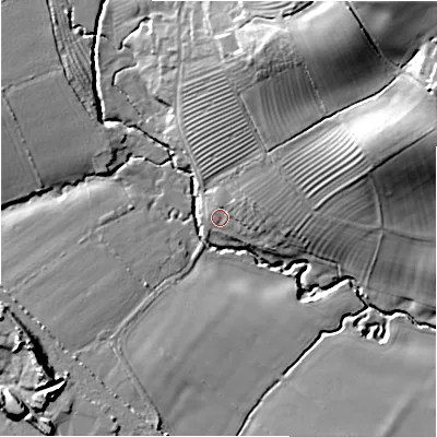 Shaded relief map of the ground around GL556XD, computed from Environment Agency LiDAR. The ground here sits at about 100 m above sea level and falls 35 m across the surrounding 800 m. Surface water reaching this point runs off ground lying to the north-east, 6.3 m higher.