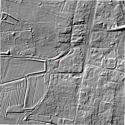 Shaded relief map of the ground around GL560BE, computed from Environment Agency LiDAR. The ground here sits at about 128 m above sea level and falls 7 m across the surrounding 800 m. Surface water reaching this point runs off ground lying to the west, 2.1 m higher.