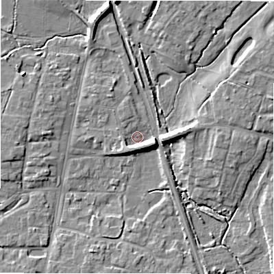 Shaded relief map of the ground around GL560JZ, computed from Environment Agency LiDAR. The ground here sits at about 127 m above sea level and falls 10 m across the surrounding 800 m. Surface water reaching this point runs off ground lying to the east-south-east, 5.9 m higher.