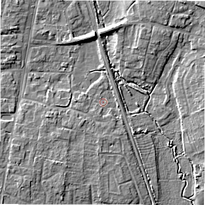 Shaded relief map of the ground around GL560LX, computed from Environment Agency LiDAR. The ground here sits at about 126 m above sea level and falls 9 m across the surrounding 800 m. Surface water reaching this point runs off ground lying to the south-west, 2.2 m higher.