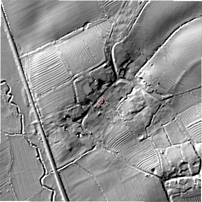 Shaded relief map of the ground around GL560NY, computed from Environment Agency LiDAR. The ground here sits at about 122 m above sea level and falls 15 m across the surrounding 800 m. Surface water reaching this point runs off ground lying to the north-west, 5.6 m higher.