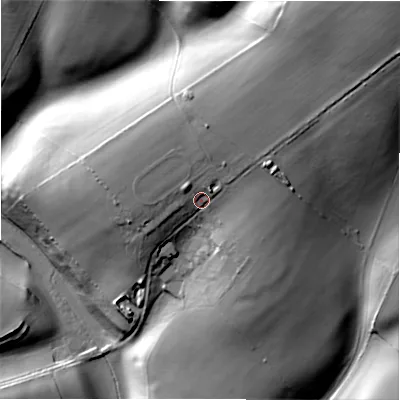 Shaded relief map of the ground around GL560RD, computed from Environment Agency LiDAR. The ground here sits at about 193 m above sea level and falls 57 m across the surrounding 800 m. Surface water reaching this point runs off ground lying to the north, 10.4 m higher.
