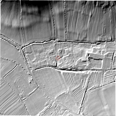 Shaded relief map of the ground around GL560RT, computed from Environment Agency LiDAR. The ground here sits at about 144 m above sea level and falls 25 m across the surrounding 800 m. Surface water reaching this point runs off ground lying to the south-south-east, 2.5 m higher.