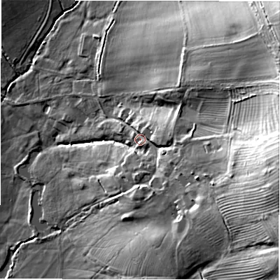 Shaded relief map of the ground around GL560UN, computed from Environment Agency LiDAR. The ground here sits at about 130 m above sea level and falls 48 m across the surrounding 800 m. Surface water reaching this point runs off ground lying to the east, 33.0 m higher.