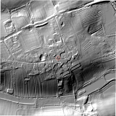 Shaded relief map of the ground around GL560UP, computed from Environment Agency LiDAR. The ground here sits at about 129 m above sea level and falls 22 m across the surrounding 800 m. Surface water reaching this point runs off ground lying to the west, 4.6 m higher.