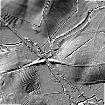 Shaded relief map of the ground around GL560YF, computed from Environment Agency LiDAR. The ground here sits at about 113 m above sea level and falls 17 m across the surrounding 800 m. Surface water reaching this point runs off ground lying to the south-south-west, 7.6 m higher.