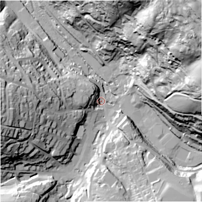 Shaded relief map of the ground around GL60AA, computed from Environment Agency LiDAR. The ground here sits at about 59 m above sea level and falls 114 m across the surrounding 800 m. Surface water reaching this point runs off ground lying to the north-east, 103.0 m higher.