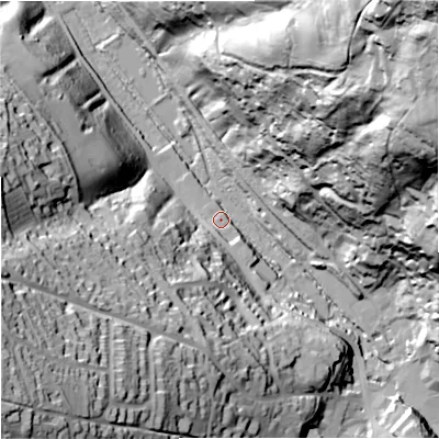 Shaded relief map of the ground around GL60BE, computed from Environment Agency LiDAR. The ground here sits at about 59 m above sea level and falls 124 m across the surrounding 800 m. Surface water reaching this point runs off ground lying to the south-west, 44.3 m higher.