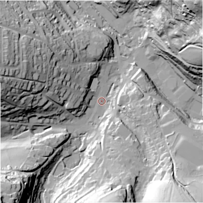 Shaded relief map of the ground around GL60DU, computed from Environment Agency LiDAR. The ground here sits at about 63 m above sea level and falls 89 m across the surrounding 800 m. Surface water reaching this point runs off ground lying to the south-west, 51.6 m higher.