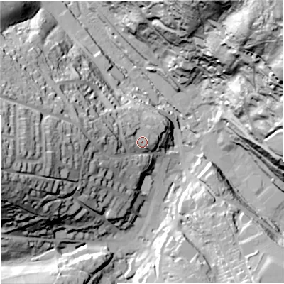 Shaded relief map of the ground around GL60LS, computed from Environment Agency LiDAR. The ground here sits at about 73 m above sea level and falls 104 m across the surrounding 800 m. Surface water reaching this point runs off ground lying to the west-north-west, 5.1 m higher.