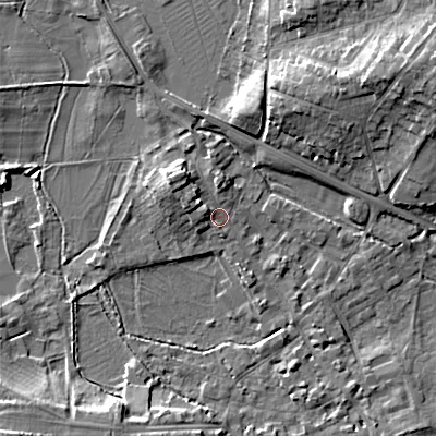 Shaded relief map of the ground around GL72DW, computed from Environment Agency LiDAR. The ground here sits at about 111 m above sea level and falls 13 m across the surrounding 800 m. Surface water reaching this point runs off ground lying to the north-west, 4.8 m higher.