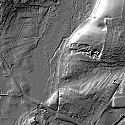 Shaded relief map of the ground around GL72DY, computed from Environment Agency LiDAR. The ground here sits at about 114 m above sea level and falls 26 m across the surrounding 800 m. Surface water reaching this point runs off ground lying to the east-north-east, 7.6 m higher.