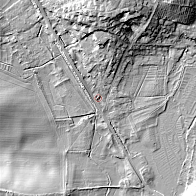 Shaded relief map of the ground around GL72JU, computed from Environment Agency LiDAR. The ground here sits at about 114 m above sea level and falls 18 m across the surrounding 800 m. Surface water reaching this point runs off ground lying to the north, 15.7 m higher.