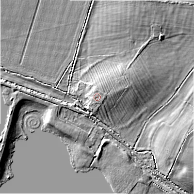Shaded relief map of the ground around GL73DX, computed from Environment Agency LiDAR. The ground here sits at about 81 m above sea level and falls 6 m across the surrounding 800 m. Surface water reaching this point runs off ground lying to the east-north-east, 0.7 m higher.