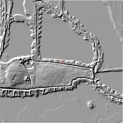 Shaded relief map of the ground around GL73FW, computed from Environment Agency LiDAR. The ground here sits at about 75 m above sea level and falls 7 m across the surrounding 800 m. Surface water reaching this point runs off ground lying to the east, 1.5 m higher.