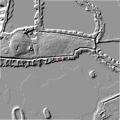 Shaded relief map of the ground around GL73FY, computed from Environment Agency LiDAR. The ground here sits at about 74 m above sea level and falls 7 m across the surrounding 800 m. Surface water reaching this point runs off ground lying to the west, 4.1 m higher.
