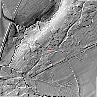 Shaded relief map of the ground around GL73JG, computed from Environment Agency LiDAR. The ground here sits at about 86 m above sea level and falls 12 m across the surrounding 800 m. Surface water reaching this point runs off ground lying to the north, 2.4 m higher.