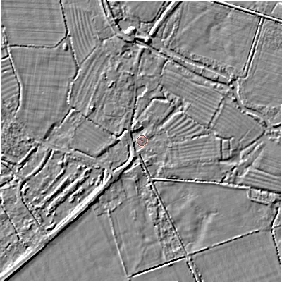 Shaded relief map of the ground around GL74DY, computed from Environment Agency LiDAR. The ground here sits at about 77 m above sea level and falls 5 m across the surrounding 800 m. Surface water reaching this point runs off ground lying to the north, 2.8 m higher.