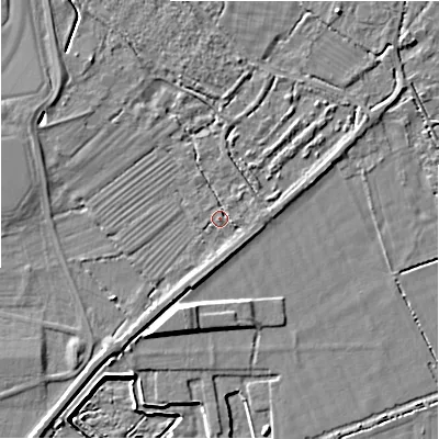Shaded relief map of the ground around GL74EB, computed from Environment Agency LiDAR. The ground here sits at about 77 m above sea level and falls 7 m across the surrounding 800 m. Surface water reaching this point runs off ground lying to the north-west, 3.3 m higher.