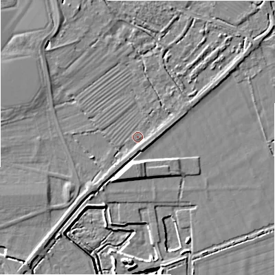 Shaded relief map of the ground around GL74ED, computed from Environment Agency LiDAR. The ground here sits at about 77 m above sea level and falls 8 m across the surrounding 800 m. Surface water reaching this point runs off ground lying to the north-north-west, 3.3 m higher.