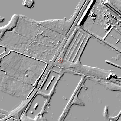 Shaded relief map of the ground around GL75RL, computed from Environment Agency LiDAR. The ground here sits at about 85 m above sea level and falls 10 m across the surrounding 800 m. Surface water reaching this point runs off ground lying to the east-south-east, 1.3 m higher.