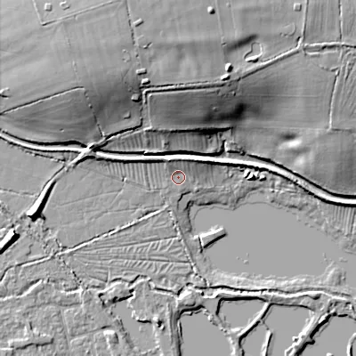 Shaded relief map of the ground around GL75TN, computed from Environment Agency LiDAR. The ground here sits at about 89 m above sea level and falls 17 m across the surrounding 800 m. Surface water reaching this point runs off ground lying to the north-north-west, 2.5 m higher.