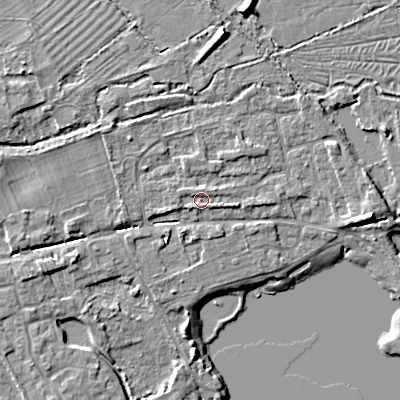 Shaded relief map of the ground around GL75UX, computed from Environment Agency LiDAR. The ground here sits at about 89 m above sea level and falls 8 m across the surrounding 800 m. Surface water reaching this point runs off ground lying to the west-north-west, 0.9 m higher.