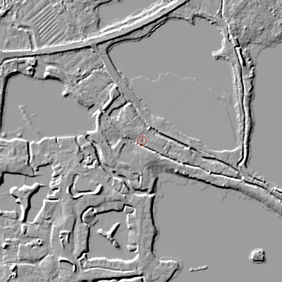 Shaded relief map of the ground around GL76BG, computed from Environment Agency LiDAR. The ground here sits at about 87 m above sea level and falls 6 m across the surrounding 800 m. Surface water reaching this point runs off ground lying to the north-west, 3.4 m higher.