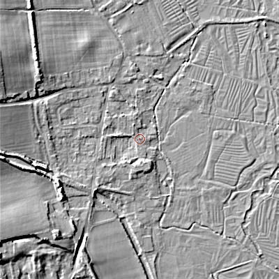 Shaded relief map of the ground around GL76HQ, computed from Environment Agency LiDAR. The ground here sits at about 100 m above sea level and falls 13 m across the surrounding 800 m. Surface water reaching this point runs off ground lying to the south-west, 2.7 m higher.