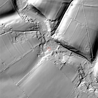 Shaded relief map of the ground around GL77AG, computed from Environment Agency LiDAR. The ground here sits at about 135 m above sea level and falls 44 m across the surrounding 800 m. Surface water reaching this point runs off ground lying to the south, 8.9 m higher.