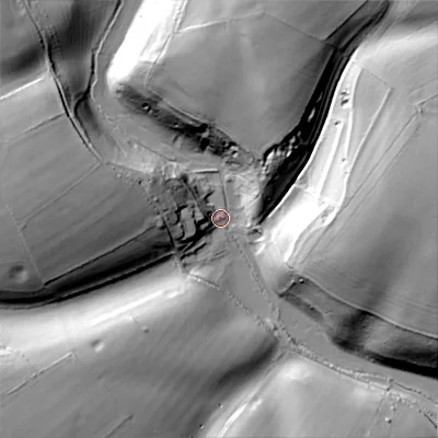 Shaded relief map of the ground around GL77AP, computed from Environment Agency LiDAR. The ground here sits at about 141 m above sea level and falls 47 m across the surrounding 800 m. Surface water reaching this point runs off ground lying to the east-north-east, 43.2 m higher.