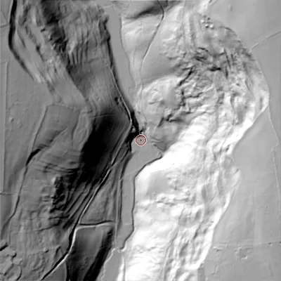 Shaded relief map of the ground around GL77LF, computed from Environment Agency LiDAR. The ground here sits at about 132 m above sea level and falls 94 m across the surrounding 800 m. Surface water reaching this point runs off ground lying to the north-east, 91.1 m higher.