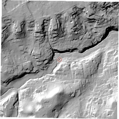 Shaded relief map of the ground around GU103LU, computed from Environment Agency LiDAR. The ground here sits at about 77 m above sea level and falls 41 m across the surrounding 800 m. Surface water reaching this point runs off ground lying to the north-west, 35.9 m higher.