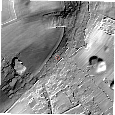 Shaded relief map of the ground around GU105QS, computed from Environment Agency LiDAR. The ground here sits at about 85 m above sea level and falls 15 m across the surrounding 800 m. Surface water reaching this point runs off ground lying to the west-south-west, 14.1 m higher.