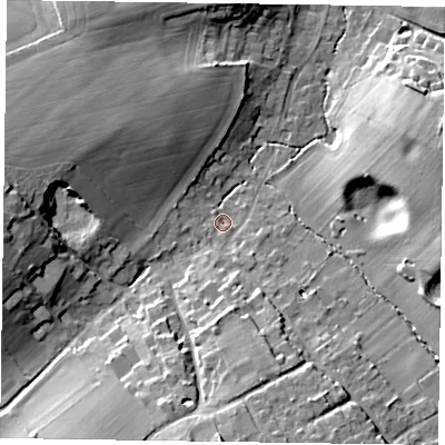 Shaded relief map of the ground around GU105QT, computed from Environment Agency LiDAR. The ground here sits at about 85 m above sea level and falls 15 m across the surrounding 800 m. Surface water reaching this point runs off ground lying to the south-east, 0.9 m higher.