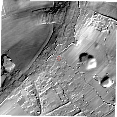 Shaded relief map of the ground around GU105QU, computed from Environment Agency LiDAR. The ground here sits at about 84 m above sea level and falls 15 m across the surrounding 800 m. Surface water reaching this point runs off ground lying to the south, 2.9 m higher.