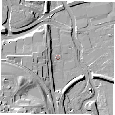 Shaded relief map of the ground around GU11BA, computed from Environment Agency LiDAR. The ground here sits at about 32 m above sea level and falls 35 m across the surrounding 800 m. Surface water reaching this point runs off ground lying to the west, 12.4 m higher.