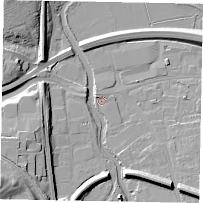 Shaded relief map of the ground around GU11DA, computed from Environment Agency LiDAR. The ground here sits at about 31 m above sea level and falls 22 m across the surrounding 800 m. Surface water reaching this point runs off ground lying to the north-west, 2.3 m higher.