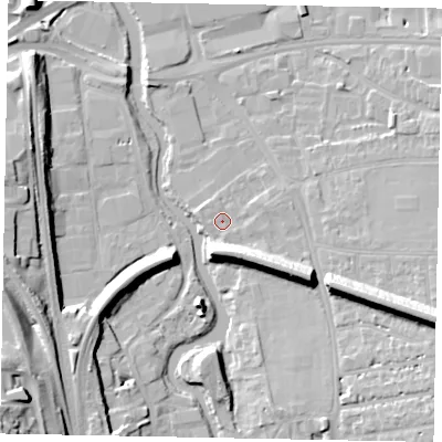 Shaded relief map of the ground around GU11EA, computed from Environment Agency LiDAR. The ground here sits at about 32 m above sea level and falls 23 m across the surrounding 800 m. Surface water reaching this point runs off ground lying to the east-south-east, 10.2 m higher.