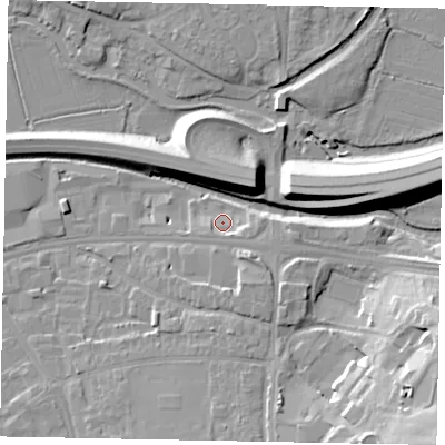 Shaded relief map of the ground around GU11FP, computed from Environment Agency LiDAR. The ground here sits at about 30 m above sea level and falls 22 m across the surrounding 800 m. Surface water reaching this point runs off ground lying to the east-south-east, 3.3 m higher.
