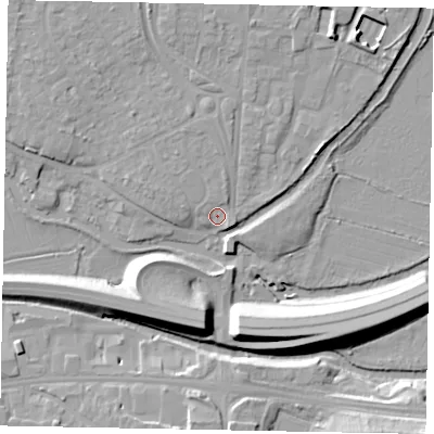 Shaded relief map of the ground around GU11LN, computed from Environment Agency LiDAR. The ground here sits at about 31 m above sea level and falls 12 m across the surrounding 800 m. Surface water reaching this point runs off ground lying to the east-south-east, 1.8 m higher.