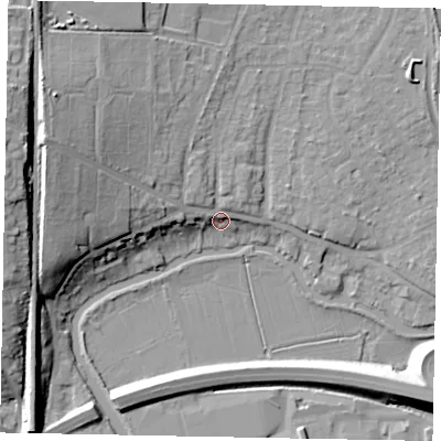 Shaded relief map of the ground around GU11LQ, computed from Environment Agency LiDAR. The ground here sits at about 33 m above sea level and falls 22 m across the surrounding 800 m. Surface water reaching this point runs off ground lying to the west-north-west, 14.0 m higher.