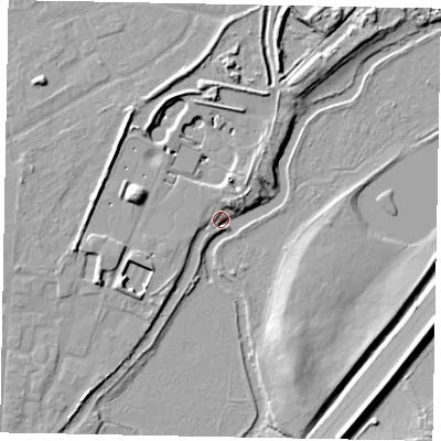 Shaded relief map of the ground around GU11QE, computed from Environment Agency LiDAR. The ground here sits at about 29 m above sea level and falls 9 m across the surrounding 800 m. Surface water reaching this point runs off ground lying to the south-south-west, 2.6 m higher.